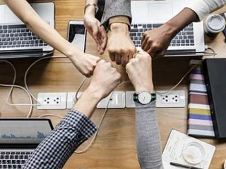 Pornsite shooting editor going over plan 