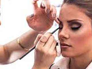 Adult Website production girl having make up done 